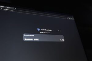 Small business owner using AI website builder on computer screen