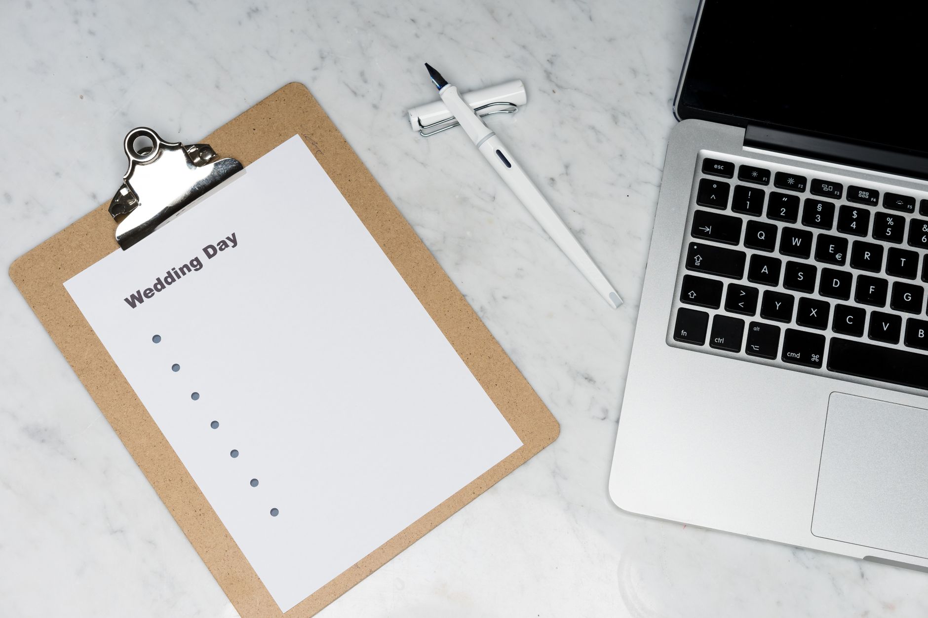 Small business owner preparing web design brief checklist