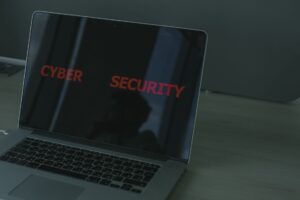 WordPress security shield protecting small business website on laptop