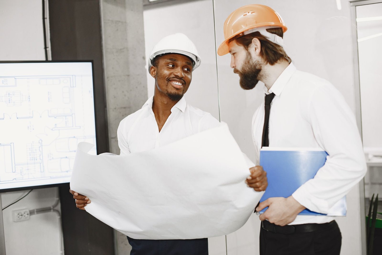 contractor meeting client blueprint